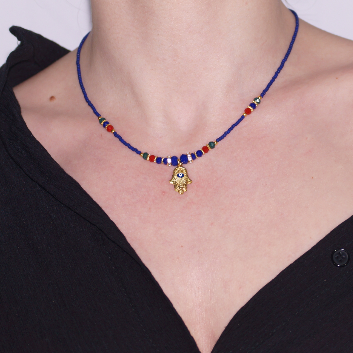 Handmade Gold Plated Hamsa Symbol Necklace with Navy Blue Stone