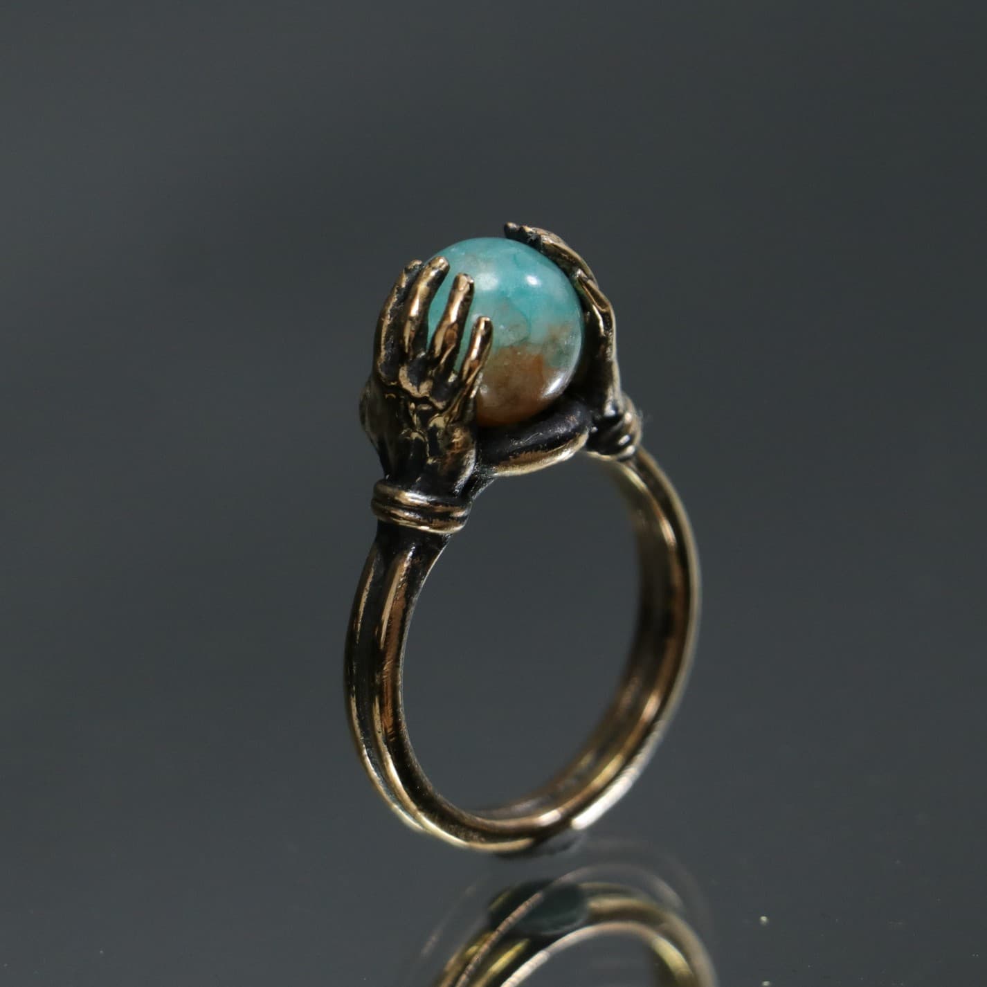 Jade Stone Ring Between Hands