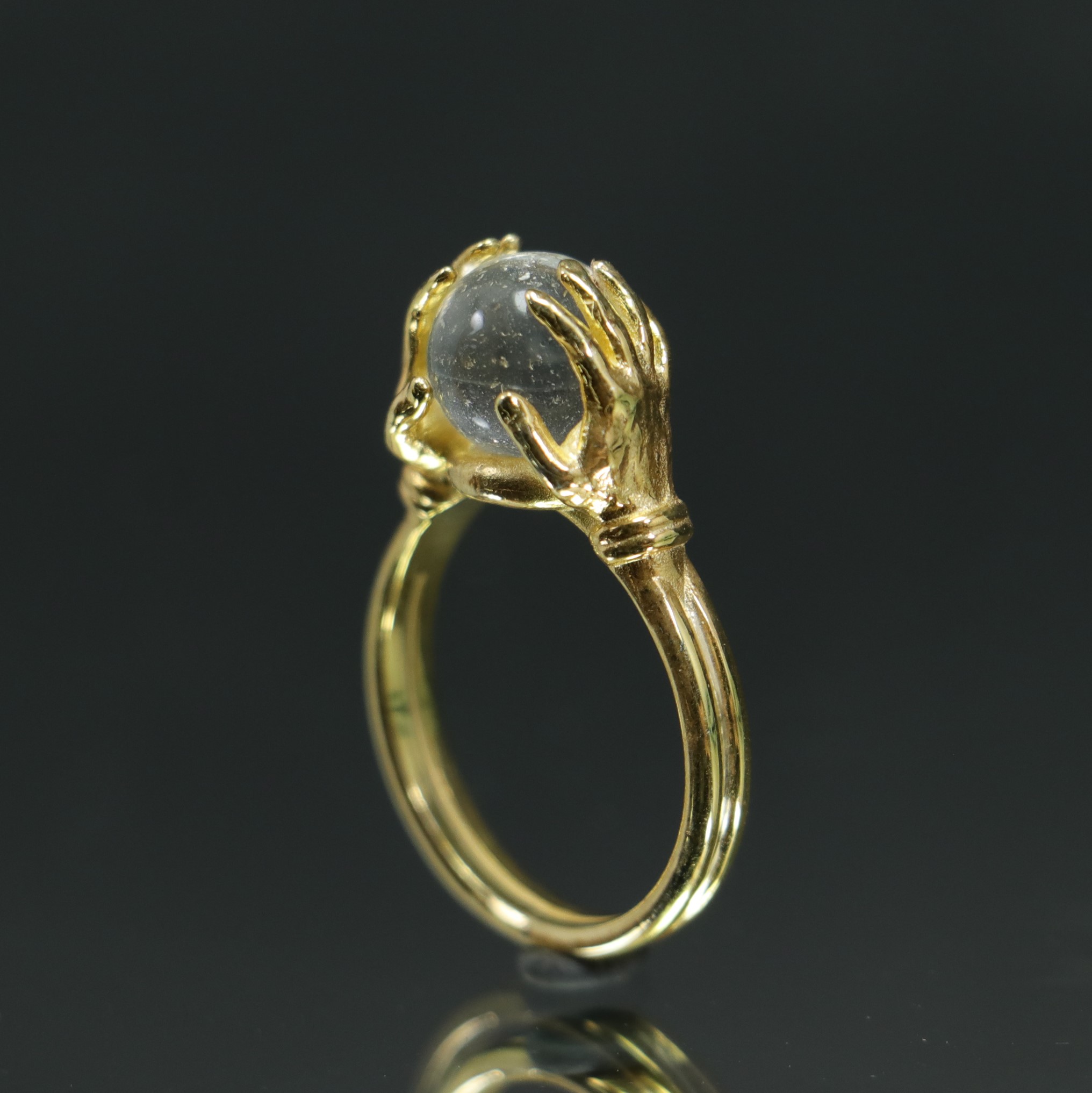 Clear Quartz 925 Sterling Silver Gold Plated Ring Between Hands