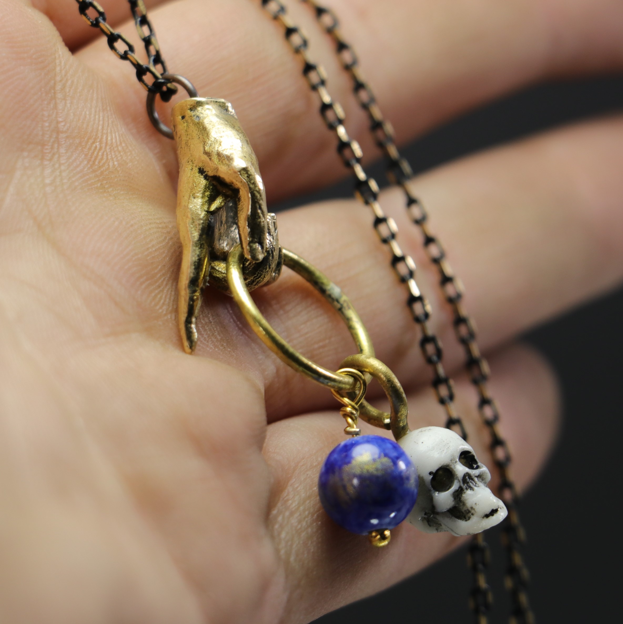 Hand and Skull Lapis Stone Necklace