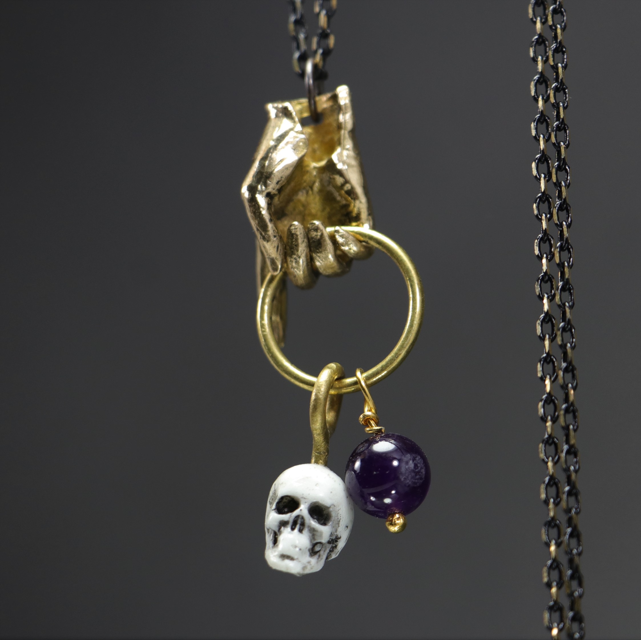 Hand and Skull Amethyst Stone Necklace