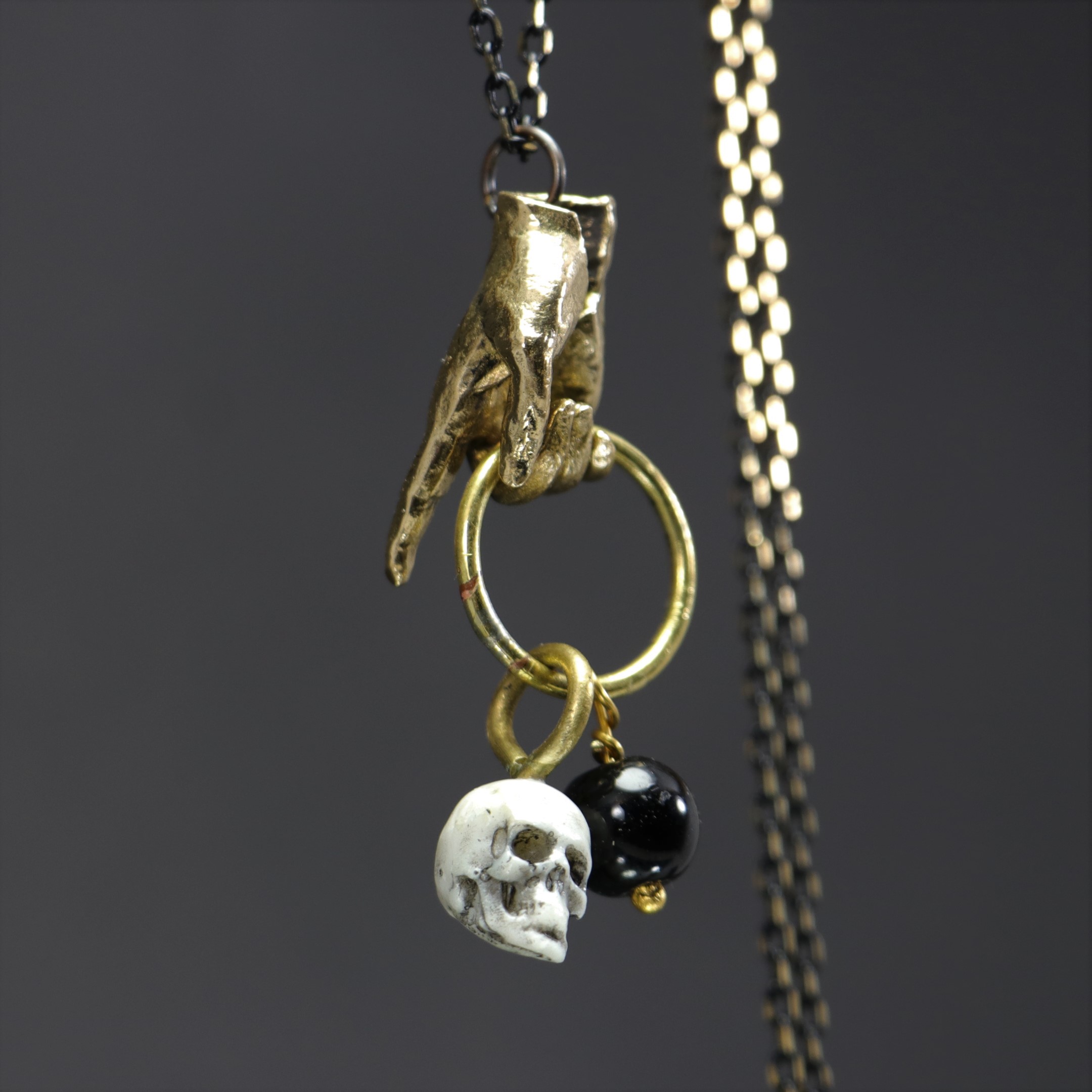 Hand and Skull Onyx Stone Necklace