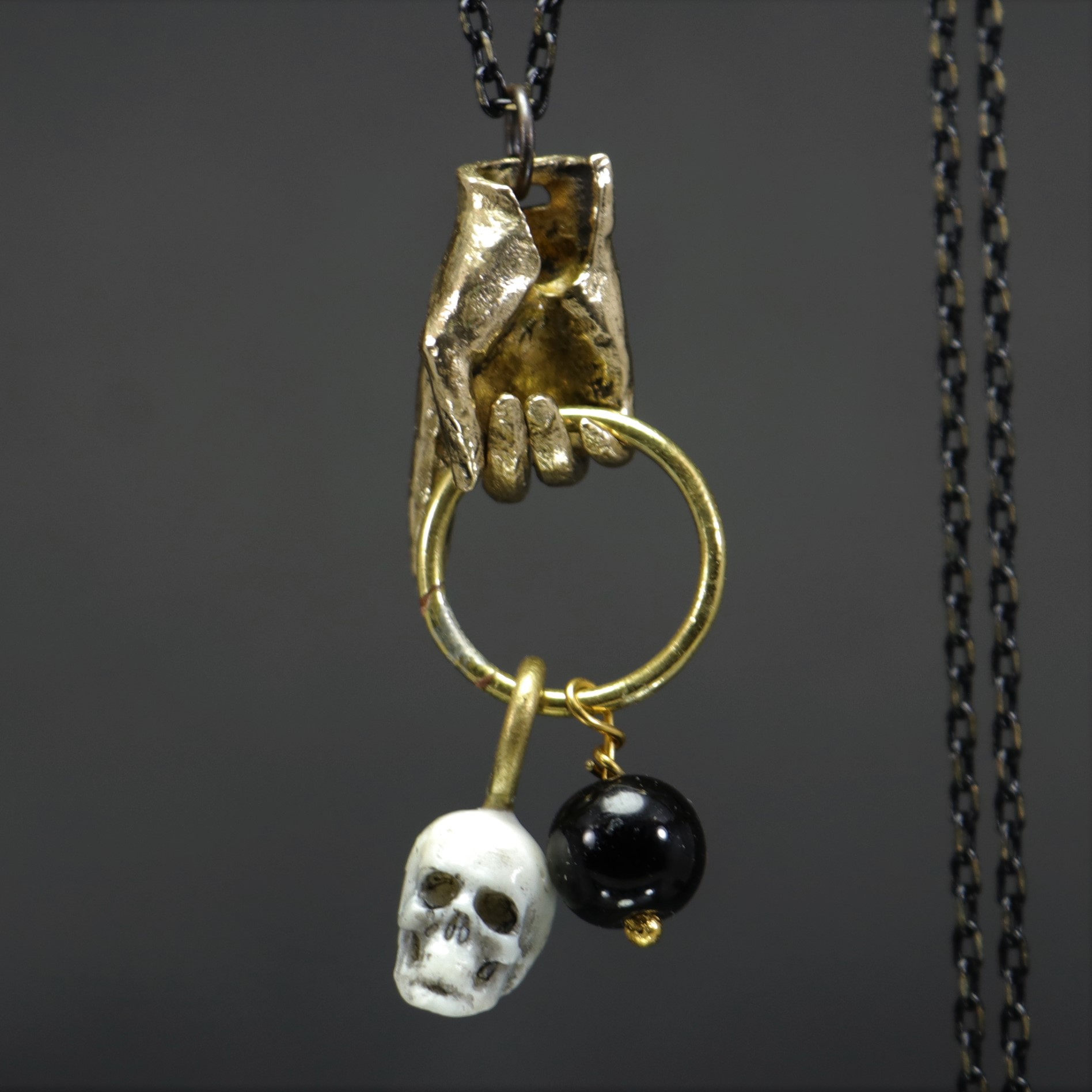 Hand and Skull Onyx Stone Necklace